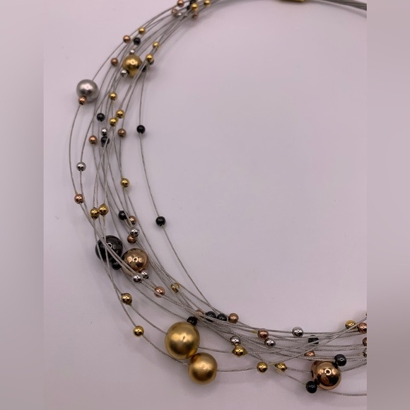 Funky multi strand adjustable necklace with gold and silver tone beads - Picture 5 of 7